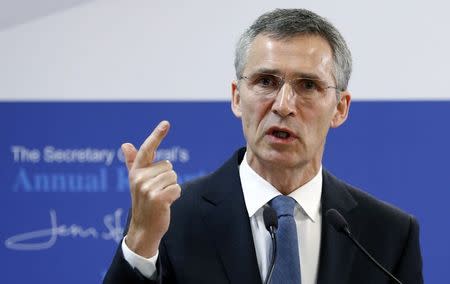 NATO Secretary General Jens Stoltenberg gestures as he addresses a news conference at the Alliance headquarters in Brussels January 30, 2015. REUTERS/Francois Lenoir