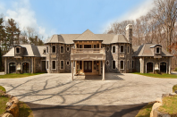 The $19 million French manor house in <a href="http://bit.ly/PXOfmS" rel="nofollow noopener" target="_blank" data-ylk="slk:Saddle River, New Jersey;elm:context_link;itc:0;sec:content-canvas" class="link ">Saddle River, New Jersey</a>, has a Corinthian stone exterior. Garages on either side shelter a total of four cars. Floor plans are shown in slides 9 and 10.