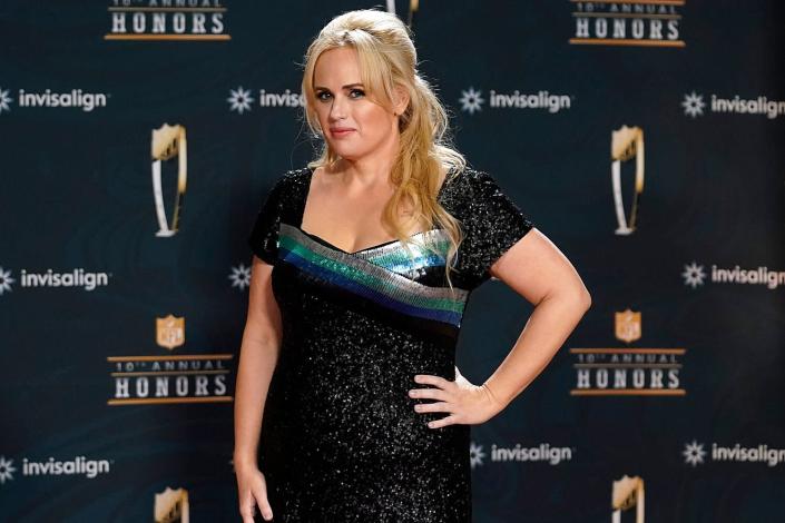 Rebel Wilson poses on the red carpet during the NFL Honors football awards show