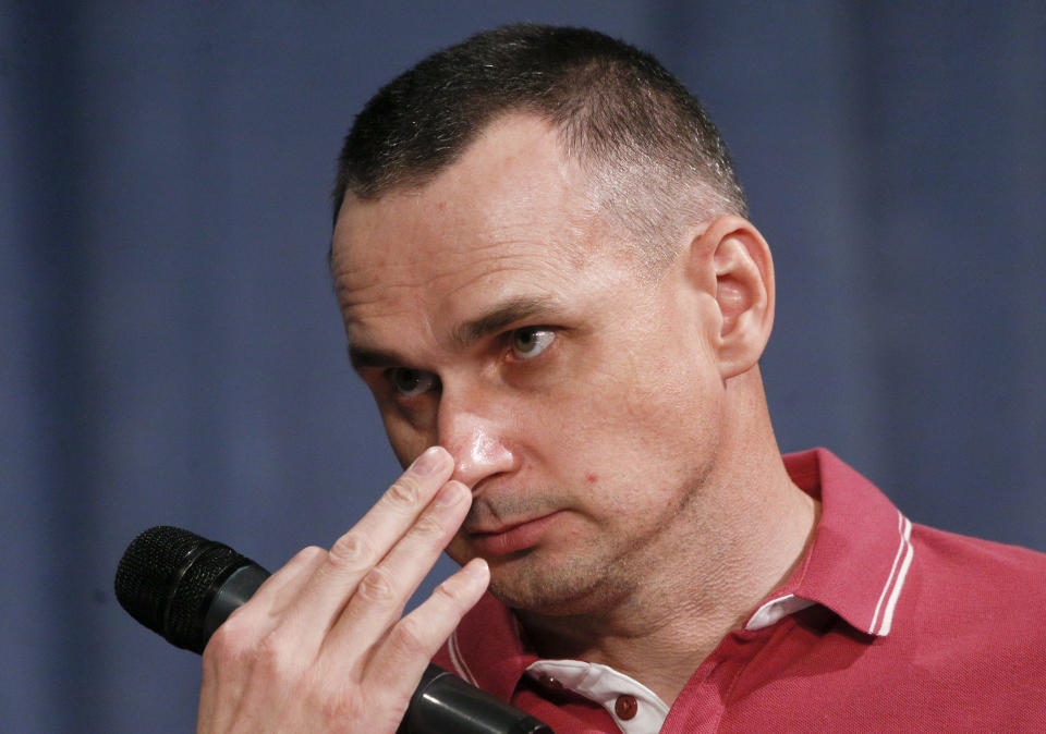 Ukrainian filmmaker Oleg Sentsov, former Russian prisoner, attends a press conference in Kyiv, Ukraine, Tuesday, Sept. 10, 2019. After five years of being locked up in a Russian prison Sentsov was one of the 35 freed Ukrainian prisoners. (AP Photo/Efrem Lukatsky)