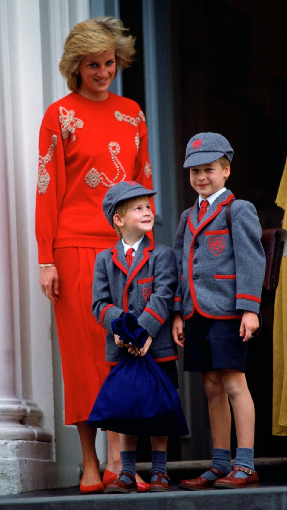 Princess Diana with a young Prince Harry and Prince William in their school uniforms