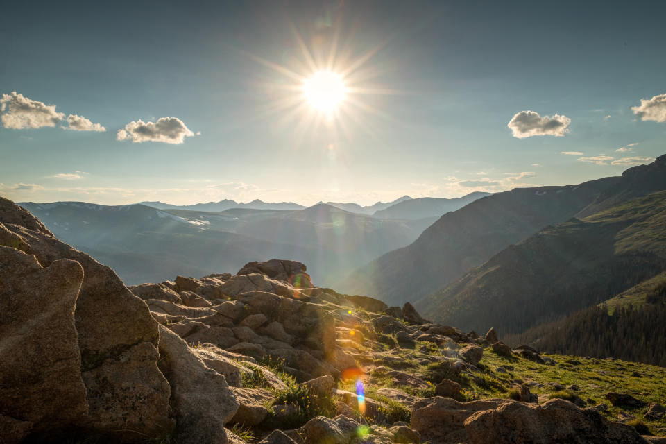 sun setting over a mountainous area of Colorado