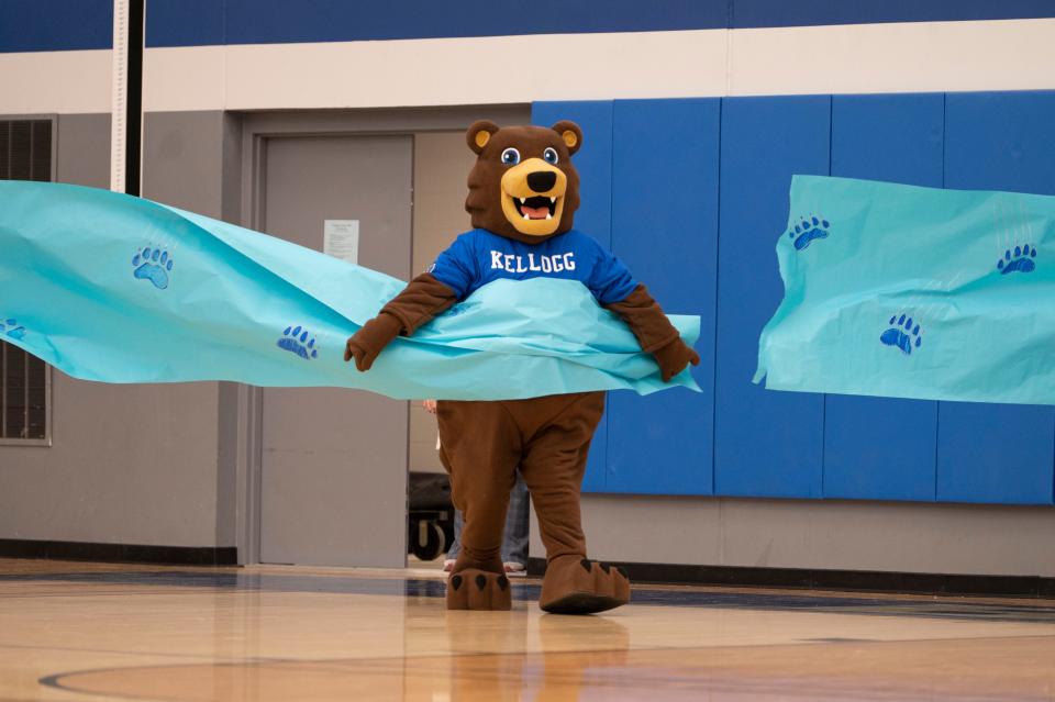 Blaze the Bruin mascot makes an entrance during a women's basketball game at Kellogg Community College on Wednesday, Feb. 1, 2023.