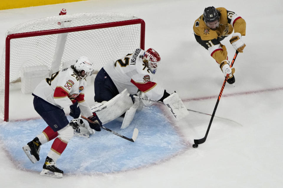 Vegas Golden Knights right wing Mark Stone (61) attempts a shot on Florida Panthers goaltender Sergei Bobrovsky (72) during the first period of an NHL hockey game Thursday, Jan. 12, 2023, in Las Vegas. (AP Photo/John Locher)