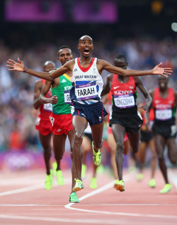 Mohamed Farah crosses the finish line to win gold in the Men's 5000m Final (Getty Images)