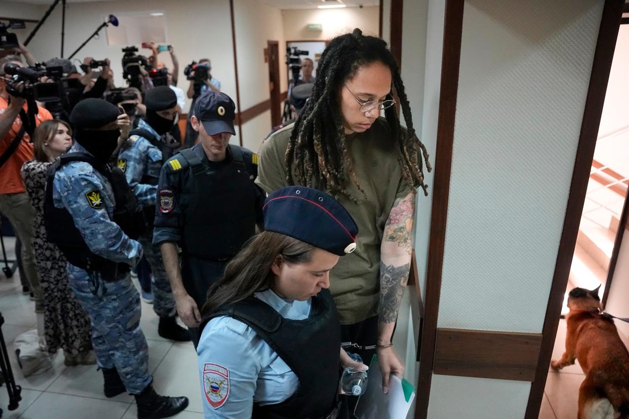 Brittney Griner is escorted to a court room prior to a hearing on Aug. 2.