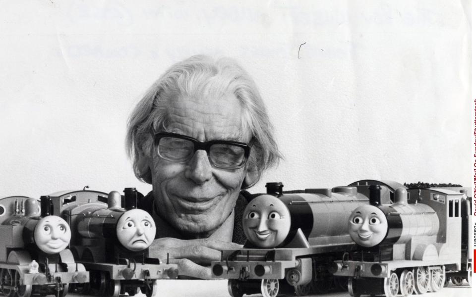 The Rev Wilbert Awdry with models Of Thomas, James, Henry and Edward in 1983 - Shutterstock