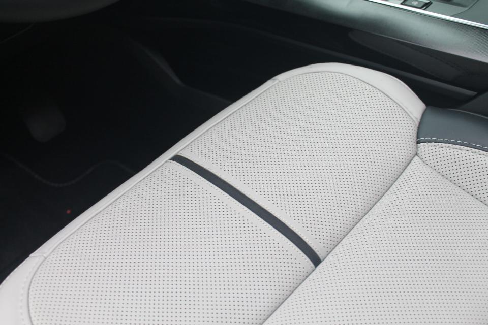 A closeup shot of the perforated leather seat in the 2023 Ford F-150 Lightning Platinum.