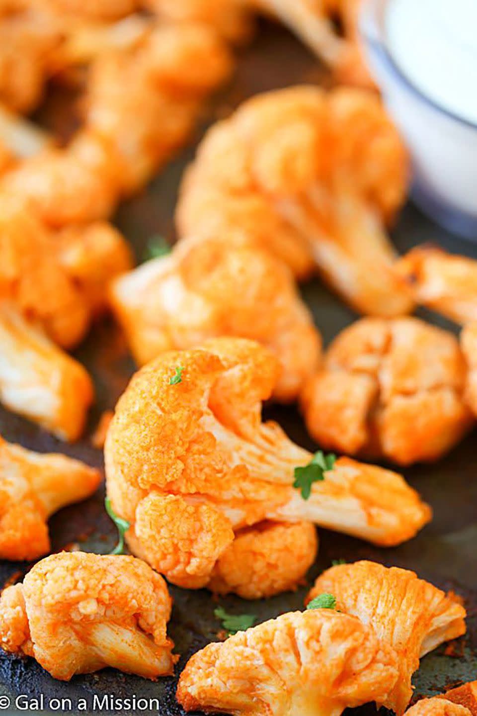 <p>All the flavor of buffalo chicken wings, minus the chicken!</p><p><strong>Get the recipe for <a href="http://www.galonamission.com/healthy-buffalo-cauliflower-bites/" rel="nofollow noopener" target="_blank" data-ylk="slk:Healthy Buffalo Cauliflower Bites;elm:context_link;itc:0" class="link ">Healthy Buffalo Cauliflower Bites</a> at Gal on a Mission.</strong></p>