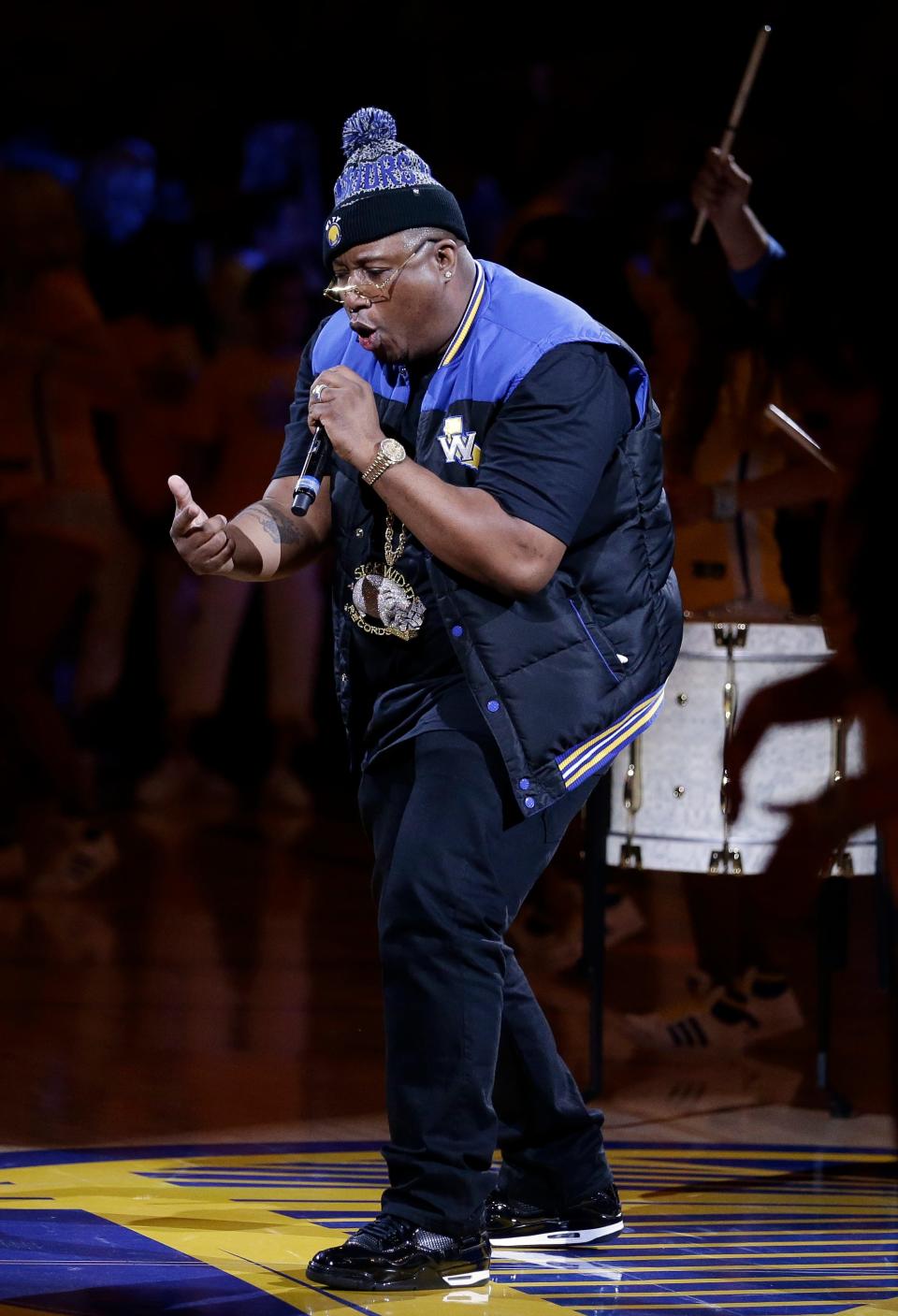 Rapper E-40 performs during halftime of Game 1 of basketball's NBA Finals between the Golden State Warriors and the Cleveland Cavaliers in Oakland, Calif., Thursday, June 4, 2015. (AP Photo/Ben Margot)