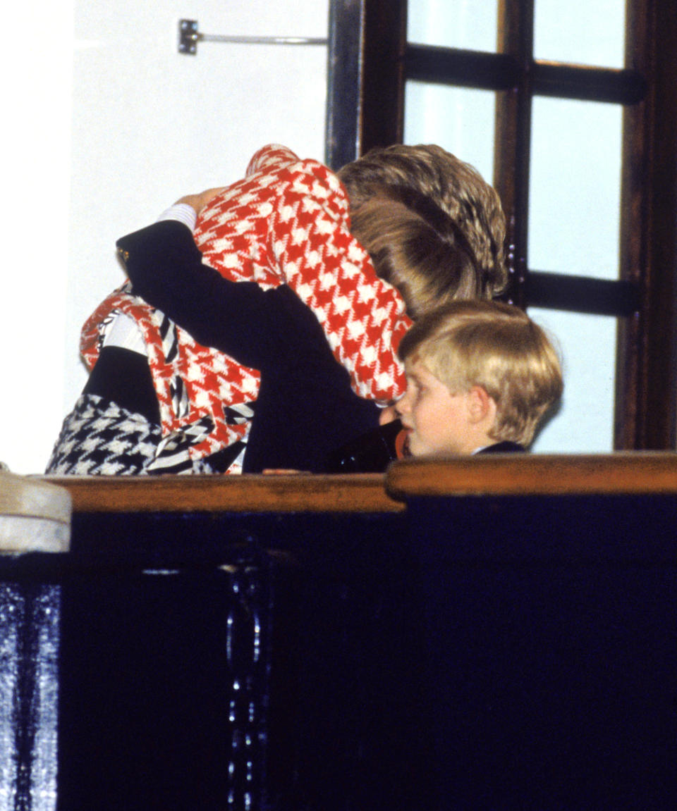 Princess Diana hugs her sons William and Harry aboard the Royal Yacht Britannia in Toronto in 1991. (Getty Images)