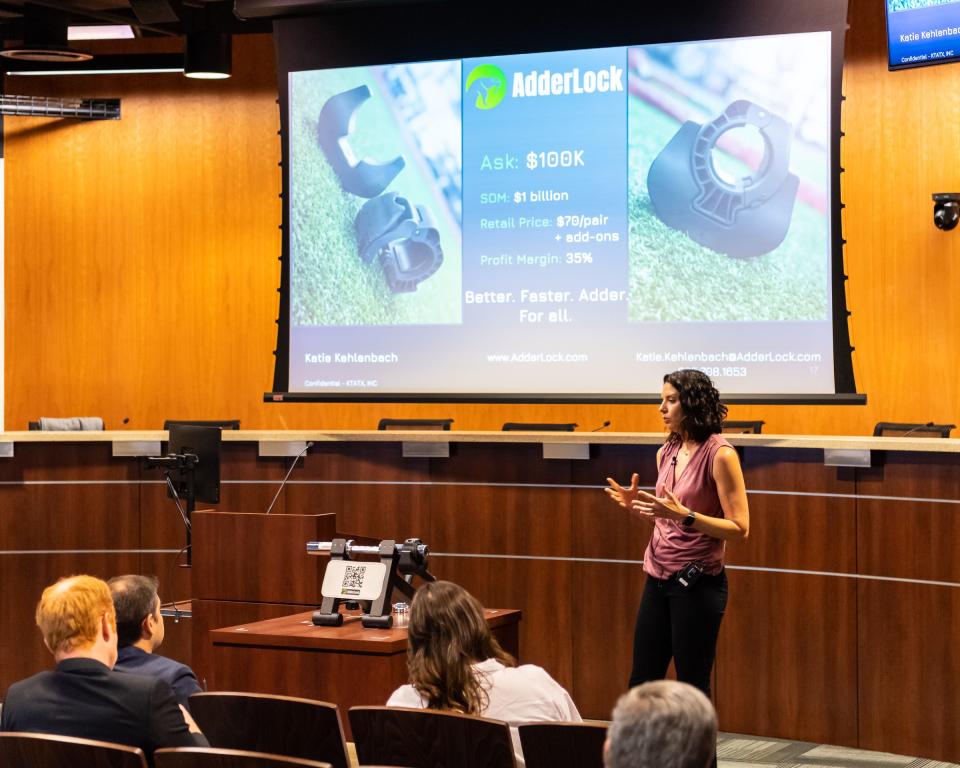 Katie Kehlenbach explains her business plan to the judges of the Round Rock Public Library's business plan competition.