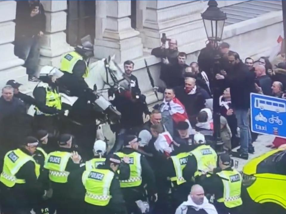 One police horse was hit by what appeared to be an umbrella (Met Police)