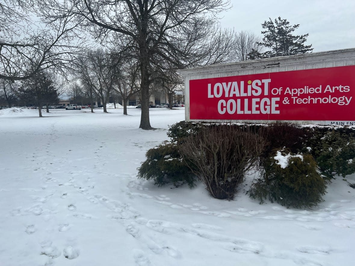 An Indian citizen who was part of the same group of migrants as a family that froze to death near the United States border in Manitoba last year has been accused of using forged high school transcripts to apply to Loyalist College in Ontario. (Simon Dingley/CBC - image credit)