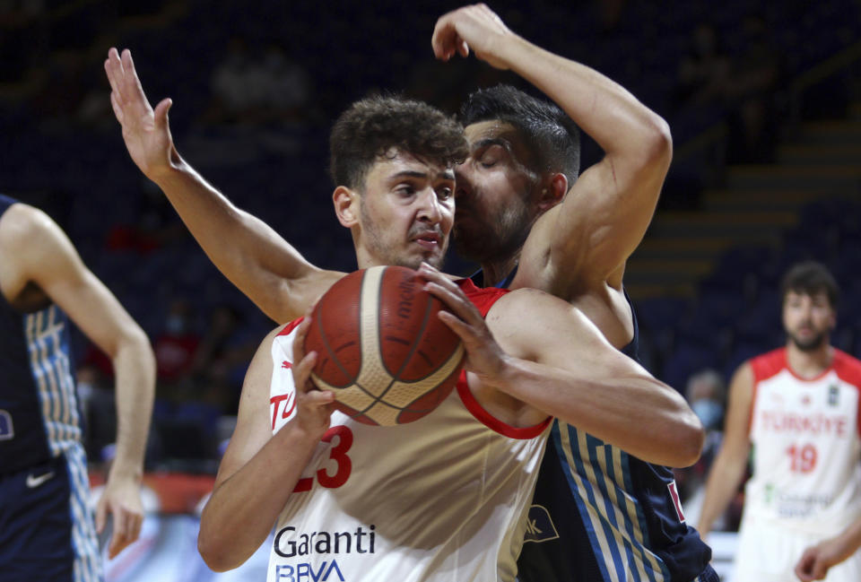 FILE - In this July 3, 2021, file photo, Turkey's Alperen Sengun looks for an opening as Greece's Konstantinos Mitoglou defends during the first half of a semifinal in the FIBA men's Olympic basketball qualifying tournament in Victoria, British Columbia. Sengun was selected by the Oklahoma City Thunder in the NBA draft. (Chad Hipolito/The Canadian Press via AP)