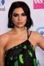 <p>Though best known for her chunky highlights, Dua Lipa's darker look shown here is easier to maintain—something we'll be seeing a lot more of. "Due to the pandemic, clients have learned to accept and appreciate their natural color," says Kristina Tabb, a celebrity colorist at <a href="https://www.tabbandsparks.com/" rel="nofollow noopener" target="_blank" data-ylk="slk:Tabb & Sparks Salon;elm:context_link;itc:0;sec:content-canvas" class="link ">Tabb & Sparks Salon</a>. And that trend isn't stopping as we approach fall 2021. "This is easily achieved by matching the base to their natural color to ensure a longer grow out with no lines of demarcation, or going for a more subtle highlight that can last an extra couple of weeks in between services." </p>