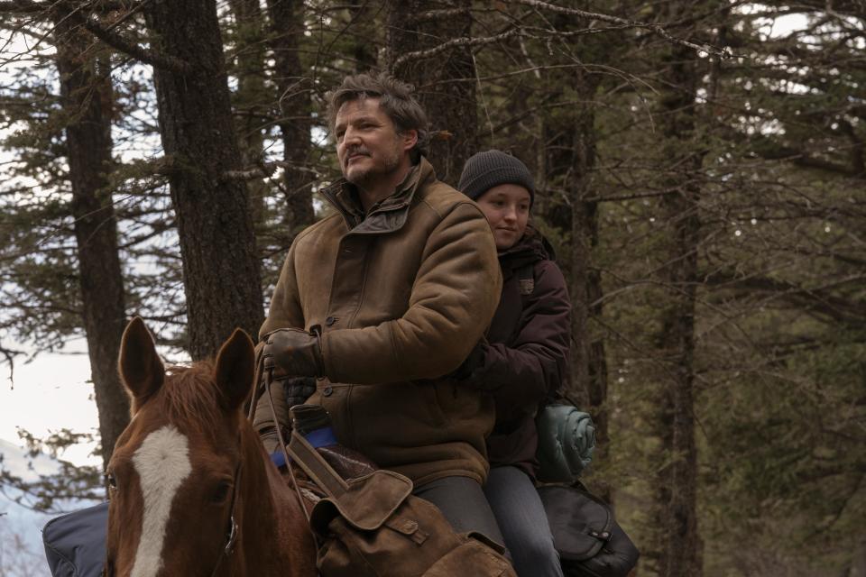 Pedro Pascal as Joel Miller & Bella Ramsey as Ellie Williams in The Last Of Us. (HBO/Sky)