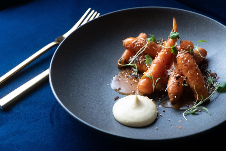 Carrots with Kimchi, Kung Pow, Cilantro and Honey at The Lobbyist at Chisca, a downtown Memphis restaurant by Chef Jimmy Gentry.