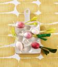 <p>Good enough to eat, these radish eggs can either be painted or dyed.</p><p><strong>To make:</strong> Paint or dye three-quarters of a blown-out white egg pink. Create roots by attaching pieces of off-white twine to the bottom with hot-glue. Roll up light green crepe paper to create a stem; seal seam with glue. Cut leaves from crepe paper; wrap around stem, and attach with glue. Glue stem to top of egg.</p><p><a class="link " href="https://www.amazon.com/Just-Artifacts-Premium-Crepe-Paper/dp/B07BTDZTM8/ref=sr_1_1_sspa?tag=syn-yahoo-20&ascsubtag=%5Bartid%7C10050.g.1111%5Bsrc%7Cyahoo-us" rel="nofollow noopener" target="_blank" data-ylk="slk:SHOP CREPE PAPER;elm:context_link;itc:0;sec:content-canvas">SHOP CREPE PAPER</a></p>