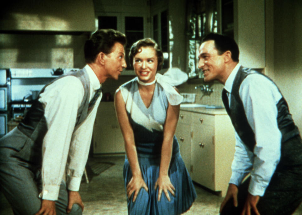 Donald O'Connor, Debbie Reynolds and Kelly greet the morning in Singin' in the Rain. (Photo: Courtesy Everett Collection)