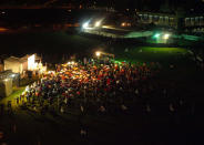 Crowd braves the rain at the PAP's rally on an open field on Rivervale Crescent in Punggol East.