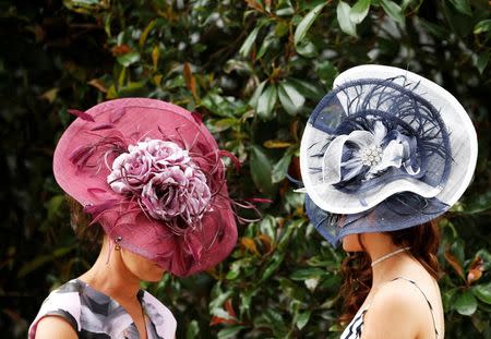 Ladies Day Racegoers wear hats at the Royal Ascot. Reuters / Andrew Boyers