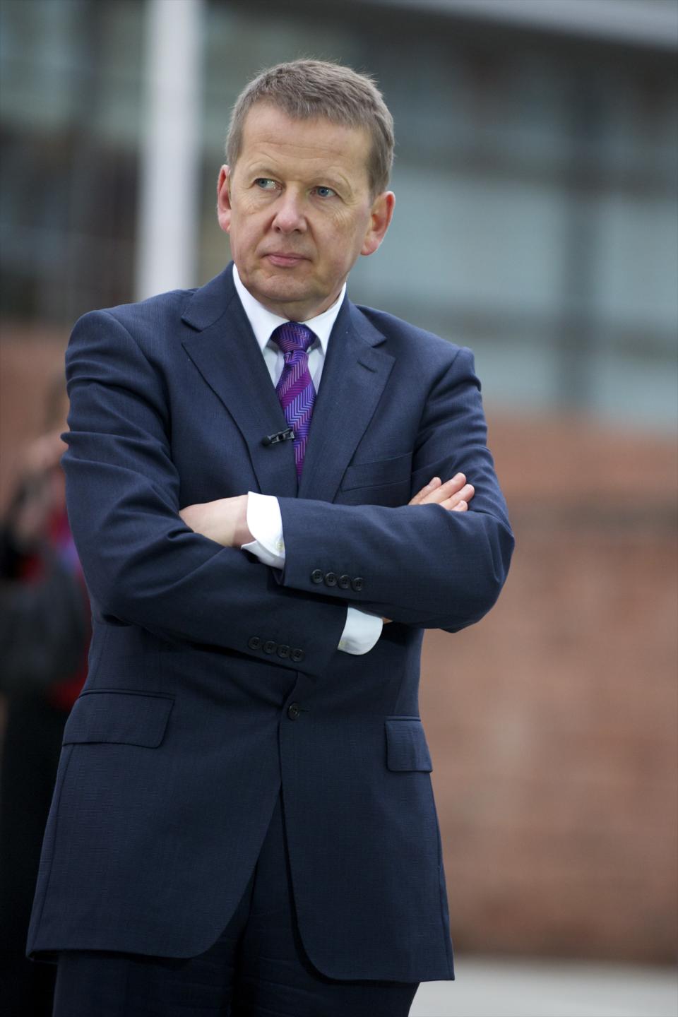 Oct. 7, 2011 - Manchester, England, UK - BBC presenter BILL TURNBULL prepares to broadcast live during the Conservatives Party Conference at Manchester Central. (Credit Image: © Mark Makela) (Photo by Mark Makela/Corbis via Getty Images)