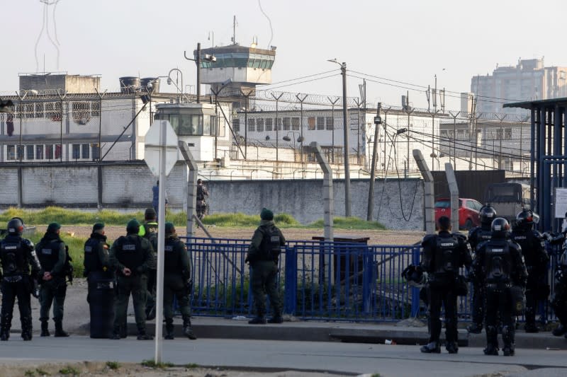 Riot police is seen outside La Modelo prison after a riot started by prisoners in Bogota