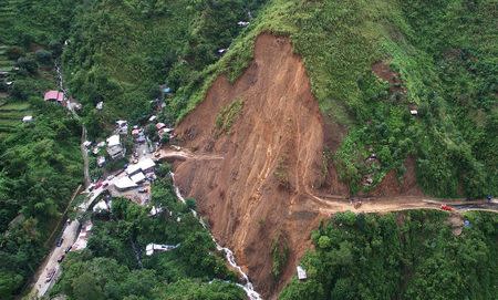 A view of a landslide caused by Typhoon Goni, which damaged a portion of Kennon Road, in Baguio city in northern Philippines August 23, 2015. REUTERS/Ompong Tan