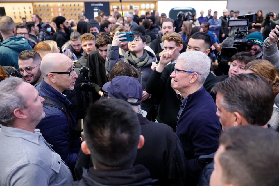 Apple CEO Tim Cook in a crowd of customers at an Apple Store in Manhattan on the day of the Vision Pro launch