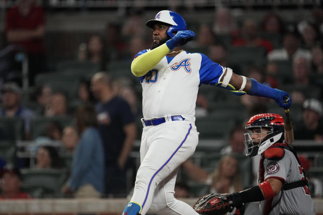 Marcell Ozuna TAKES SELFIE after hitting home run, Reds then hit his  teammate 