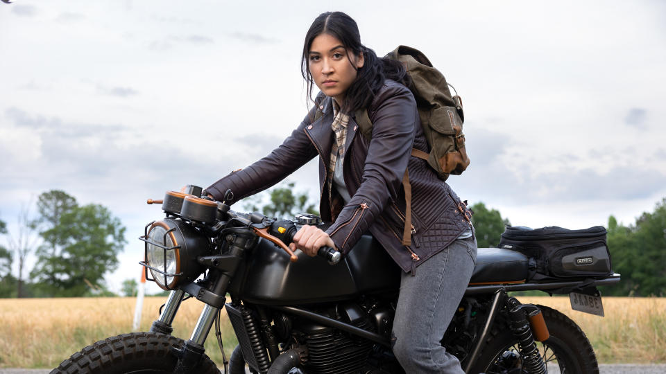 Maya Lopez stares into the camera while she sits on her motorbike in Marvel's Echo on Disney Plus