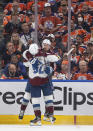 Colorado Avalanche left wing Gabriel Landeskog (92) and right wing Valeri Nichushkin (13) celebrate Nichushkin's goal against the Edmonton Oilers during the second period of Game 3 of the NHL hockey Stanley Cup playoffs Western Conference finals, Saturday, June 4, 2022, in Edmonton, Alberta. (Jason Franson/The Canadian Press via AP)