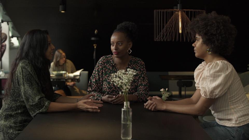 Three women at a table