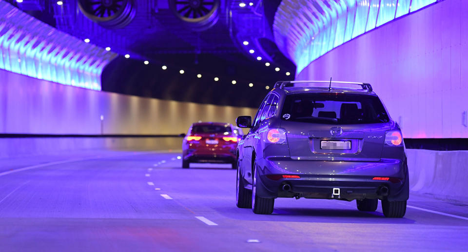 The first cars drive through the NorthConnex tunnel. Source: AAP