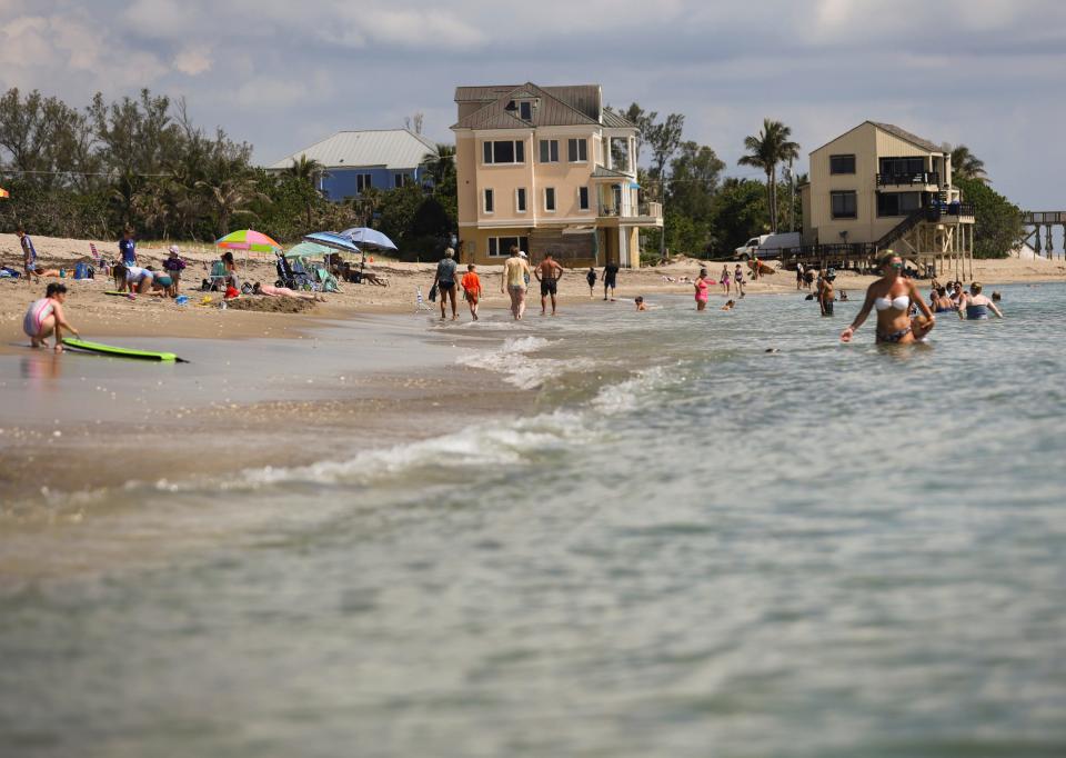 Beachgoers relax, swim and play at Bathtub Beach, 1585 S.E. MacArthur Blvd., on Monday, June 10, 2024, on Hutchinson Island in Martin County. Bathtub Beach reopened Saturday, but will close again Sunday, June 16. The beach renourishment project is done and the third phase to raise Southeast MacArthur Boulevard begins Monday.