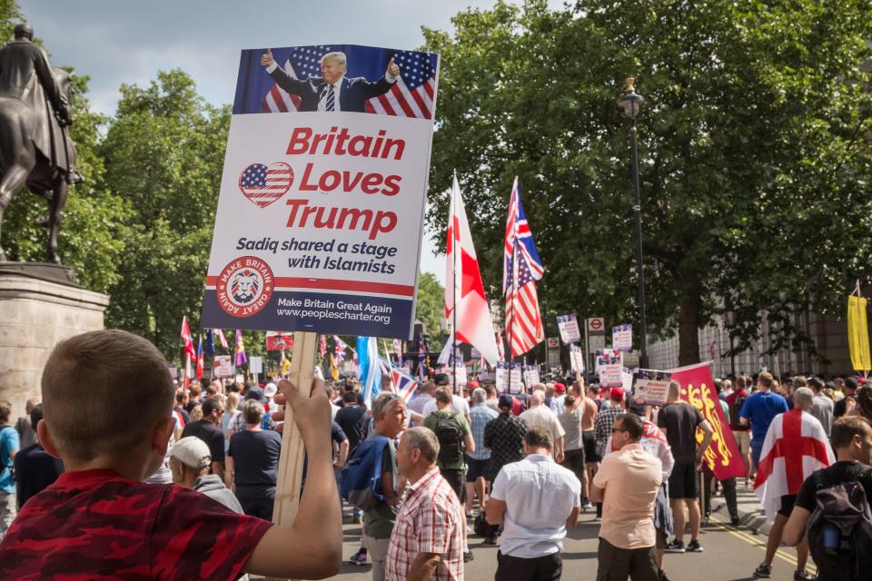 <p>A child holds placard by Ukip affiliate ‘Make Britain Great Again’ at a 2018 protest in London</p> (Alamy)