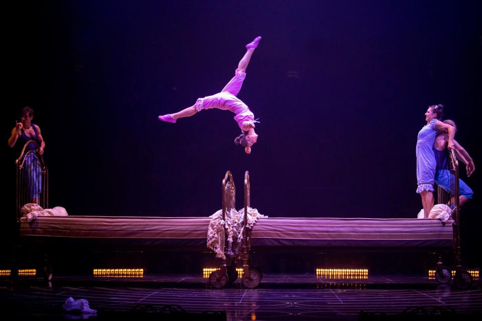 A performer flips in Cirque du Soleil's "Corteo."
