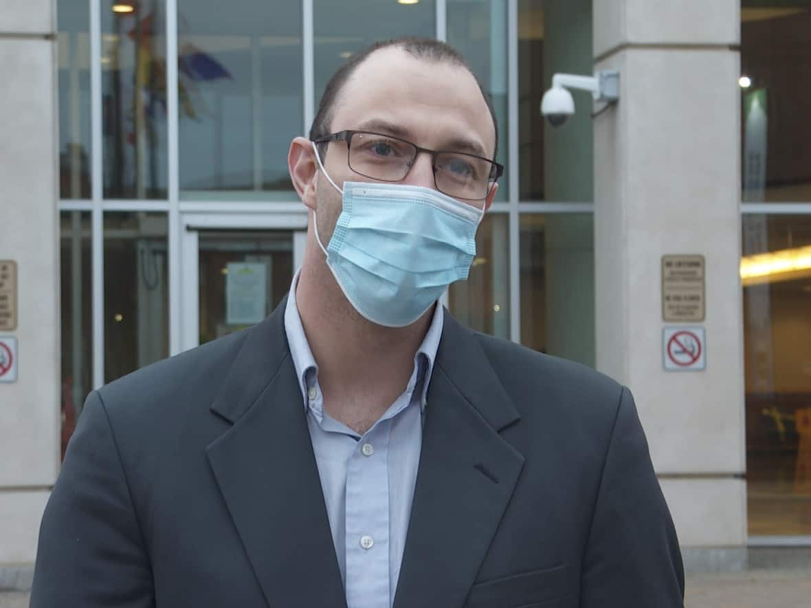 Justin Breau was killed in his apartment Wednesday. This picture shows him outside the Saint John courthouse, where he was tried for murder and acquitted in 2020. (Graham Thompson/CBC - image credit)