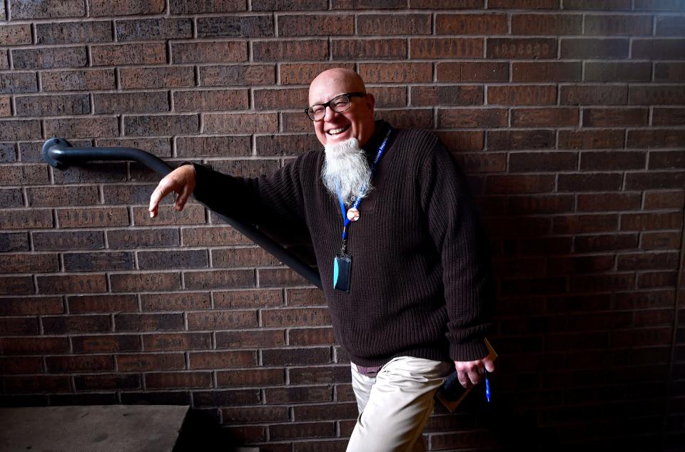 Reporter-News Editor Greg Jaklwicz in the stairwell of the parking garage servicing the new home for the newspaper, the First Financial West Building on Dec. 27, 2018.