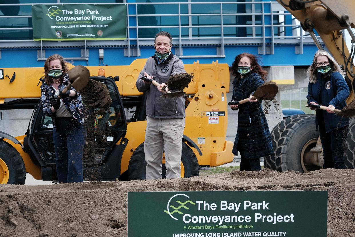 New York Governor Andrew Cuomo shovels dirt for the cameras at Bay Park Water Reclamation Facility on Earth Day on April 22, in East Rockaway, New York. Cuomo was at the water reclamation plant for a ground breaking ceremony at the Bay Park Conveyance Project. 