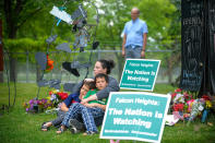 <p>Kate Khaled, of St. Paul, Minn., and her two sons, Jibreel, 8, left, and Esa, 7, sit Friday, June 16, 2017, at the memorial near the site where Philando Castile was shot and killed during a traffic stop by St. Anthony police Officer Jeronimo Yanez last July. The two boys went to J.J. Hill Montessori and knew “Mr. Phil.” Yanez was cleared Friday in the fatal shooting of Castile, a black motorist whose death captured national attention when his girlfriend streamed the grim aftermath on Facebook. (Aaron Lavinsky/Star Tribune via AP) </p>