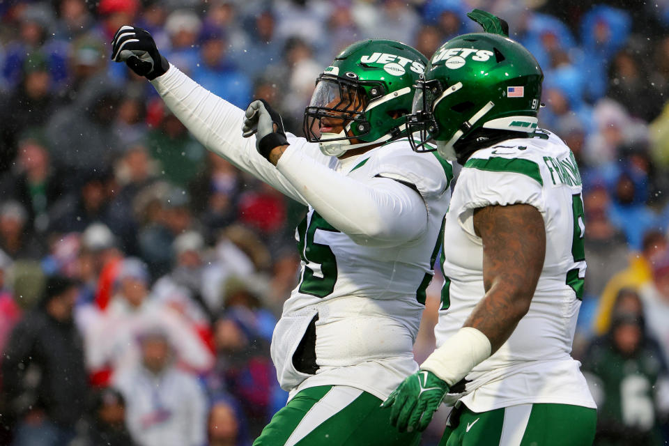 ORCHARD PARK, NEW YORK - DECEMBER 11: Quinnen Williams #95 of the New York Jets celebrates after sacking Josh Allen #17 of the Buffalo Bills in the first quarter at Highmark Stadium on December 11, 2022 in Orchard Park, New York. (Photo by Timothy T Ludwig/Getty Images)