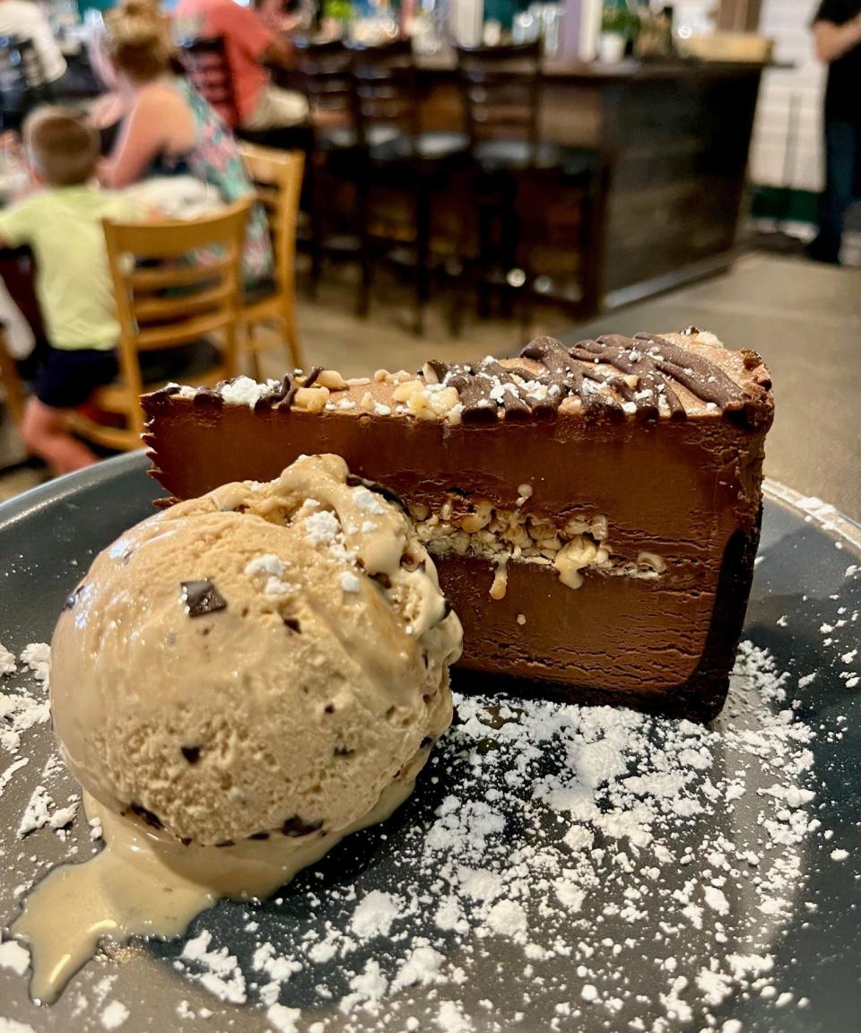 Front Porch Social's chocolate toffee mousse is served with coffee toffee ice cream.