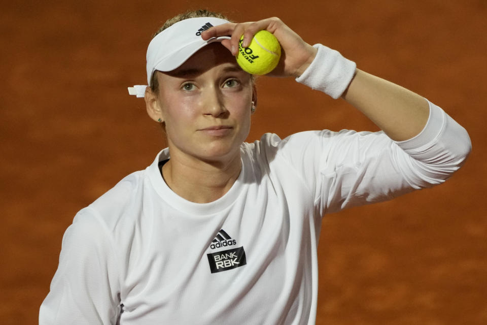 FILE - Kazakhstan's Elena Rybakina prepares to serving during a semifinal match against Latvia's Jeļena Ostapenko at the Italian Open tennis tournament in Rome, Italy, Friday, May 19, 2023. Rybarkina is expected to compete at Wimbledon next week. (AP Photo/Alessandra Tarantino, File)