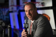 Utah head coach Larry Krystkowiak speaks during the Pac-12 NCAA college basketball media day, in San Francisco, Tuesday, Oct. 8, 2019. (AP Photo/D. Ross Cameron)