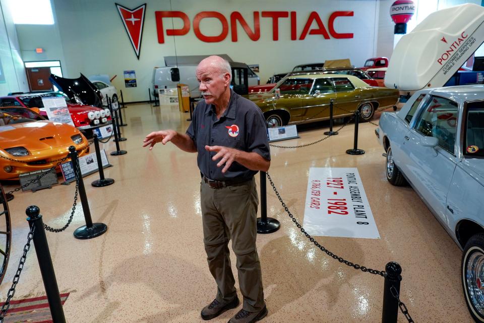 Board Chair Terry Connolly gives a tour of the new Pontiac Transportation Museum that features a collection of vintage Pontiac cars, military vehicles and other transportation artifacts from Pontiac's history, Thursday, July 18, 2024.