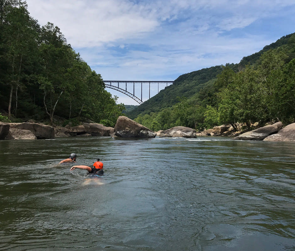 <p>Cyndi Monaghan/Getty Images</p><p>Fayetteville’s outdoor credentials got a boost when <a href="https://www.nps.gov/neri/" rel="nofollow noopener" target="_blank" data-ylk="slk:New River Gorge;elm:context_link;itc:0;sec:content-canvas" class="link ">New River Gorge</a> gained national park status in late 2020, but those who call this small town home have always been clued in on vast outdoor recreation opportunities and water sports. Fayetteville has world-class whitewater to ride on the New and Gauley rivers, or change up your pace with a guided paddle boarding trip to waterfalls with <a href="https://www.mtnsurfps.com/" rel="nofollow noopener" target="_blank" data-ylk="slk:Mountain Surf Paddle Sports.;elm:context_link;itc:0;sec:content-canvas" class="link ">Mountain Surf Paddle Sports.</a></p><p><strong>When to Visit:</strong> Take advantage of the water activities in the summer. Or, time your trip around the <a href="https://officialbridgeday.com/" rel="nofollow noopener" target="_blank" data-ylk="slk:Bridge Day;elm:context_link;itc:0;sec:content-canvas" class="link ">Bridge Day</a> festival (third Saturday in October, so Oct. 19, 2024). Daredevils can BASE jump off the New River Gorge Bridge into the Gorge 876 feet below.</p><p><strong>What to Do:</strong> For your own bridge adventure, clip into a safety cable and walk the <a href="https://bridgewalk.com/" rel="nofollow noopener" target="_blank" data-ylk="slk:New River Gorge Bridge Walk;elm:context_link;itc:0;sec:content-canvas" class="link ">New River Gorge Bridge Walk</a>. You’re about 25 feet below the roadway, nearly 900 feet above the river, and the length of the bridge is 3,030 feet.</p><p><strong>Where to Stay:</strong> The 14-room, Queen Anne-style <a href="https://www.morrisharveyhouse.com/Rosas-Speakeasy.html" rel="nofollow noopener" target="_blank" data-ylk="slk:Historic Morris Harvey House;elm:context_link;itc:0;sec:content-canvas" class="link ">Historic Morris Harvey House</a> is our favorite historic hideaway here, equipped with an on-site speakeasy called <a href="https://www.morrisharveyhouse.com/Rosas-Speakeasy.html" rel="nofollow noopener" target="_blank" data-ylk="slk:Rosa’s;elm:context_link;itc:0;sec:content-canvas" class="link ">Rosa’s</a>.</p><p><strong>Where to Eat:</strong> Enjoy breakfast sammies and lunchtime paninis inside <a href="https://www.thecathedralcafe.com/" rel="nofollow noopener" target="_blank" data-ylk="slk:Cathedral Cafe;elm:context_link;itc:0;sec:content-canvas" class="link ">Cathedral Cafe</a>, which took over an old church and kept the stained glass windows. The housemade chips get rave reviews at <a href="https://www.secretsandwichsociety.com/" rel="nofollow noopener" target="_blank" data-ylk="slk:Secret Sandwich Society;elm:context_link;itc:0;sec:content-canvas" class="link ">Secret Sandwich Society</a>. Drink local and catch some live music in the arty, mural-filled <a href="https://freefolkbrew.com/" rel="nofollow noopener" target="_blank" data-ylk="slk:Freefolk Brewery;elm:context_link;itc:0;sec:content-canvas" class="link ">Freefolk Brewery</a>.</p>