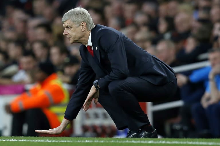 Arsenal's French manager Arsene Wenger gestures on the touchline during their English FA cup quarter final football match against Lincoln City at The Emirates Stadium in London on March 11, 2017