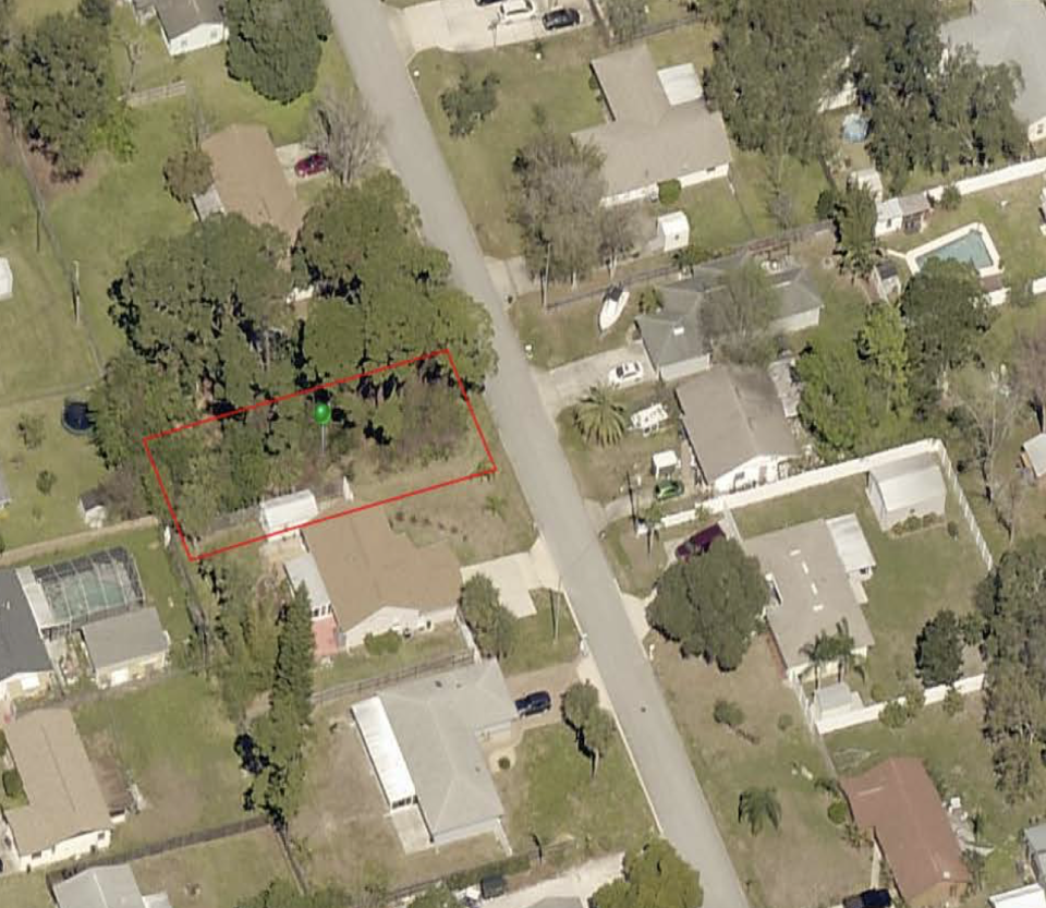 Property at Auburn Avenue in New Smyrna Beach. The lot, along with three other city-owned properties, will be donated by the city through an application process so that it can be used for an affordable housing development.